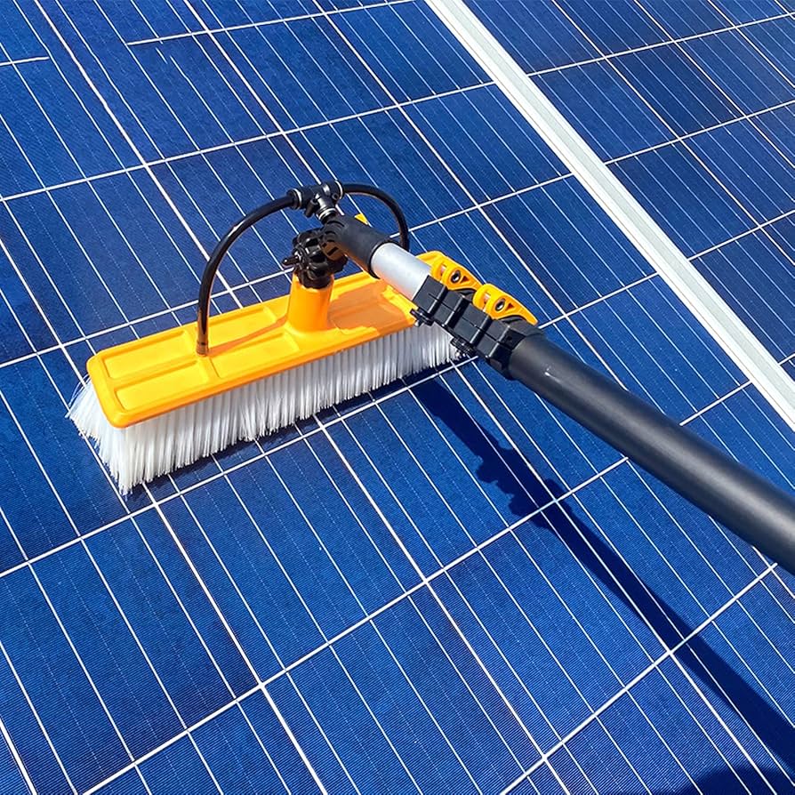Water-fed brush cleaning a solar panel